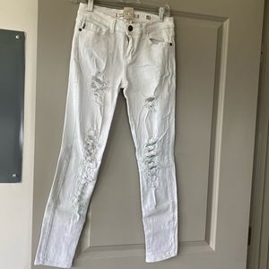 White jeans with holes